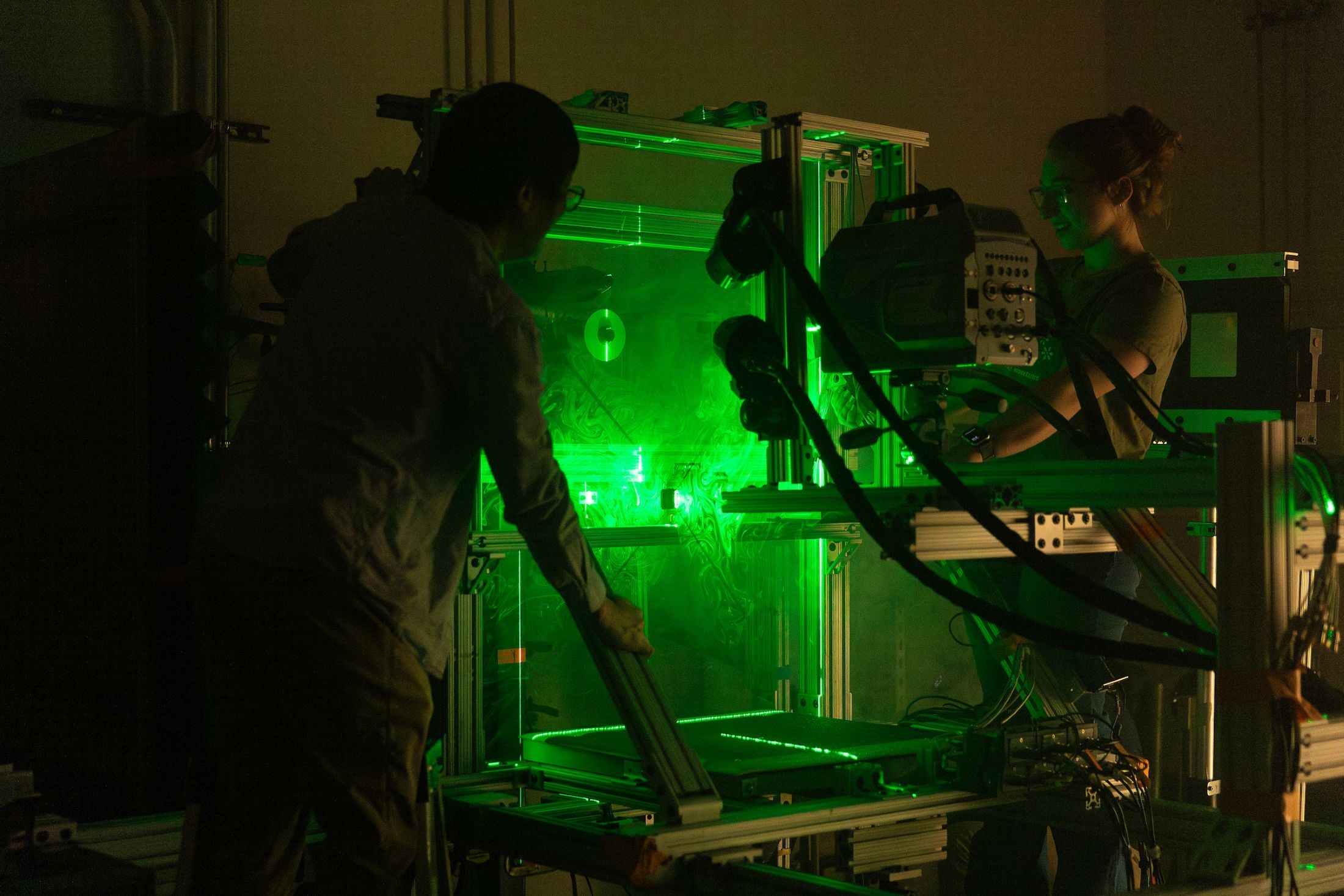 Postdoc MyungJun Song (left) and doctoral student Allie Gagne work in the Short Takeoff and Vertical Landing (STOVL) lab at the Florida Center for Advanced Aero-Propulsion (FCAAP) in the Aero-Propulsion Mechatronics & Energy (AME) building at FAMU-FSU College of Engineering in Tallahassee, Florida. (Scott Holstein/FAMU-FSU College of Engineering)