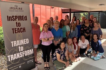 Teachers from 2025 Professional Development Courses with InSPIRE Sign: InSPIREd to Teach; Trained to Transform